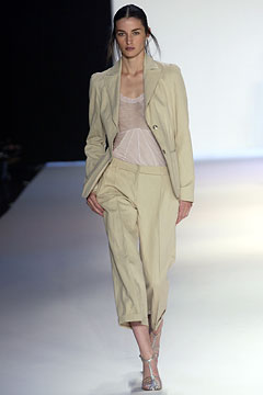 beige tailored suit with lace bodysuit