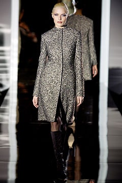 fitted black and gold coat