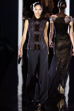 black silk sleeveless high-neck fitted beaded shiny top