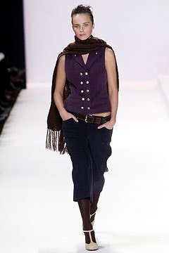 purple fitted top with cropped pants