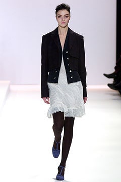 black fitted jacket with white dress