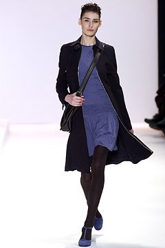 black coat blue dress