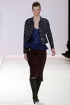 embroidered black and white jacket with blue silk top