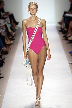 pink strapless swimsuit with white bag