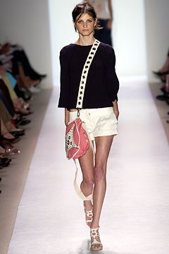 black fitted top with white shorts