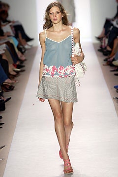 blue silk sleeveless top with floral design