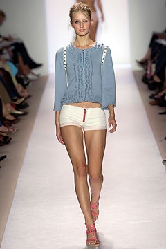 blue fitted top with white shorts