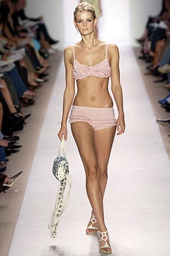 pink ruffled bikini and shorts