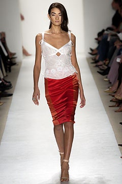 white embroidered silk top and red satin skirt