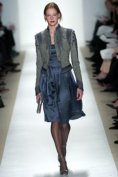 gray embroidered jacket and blue dress