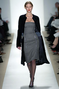 gray fitted midi dress with black coat