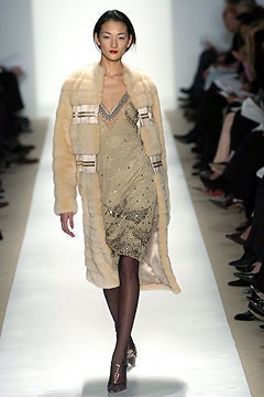 beige fur coat and gold dress