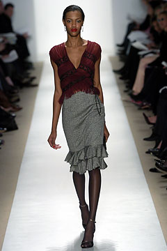 red silk ruffled top with gray tiered skirt