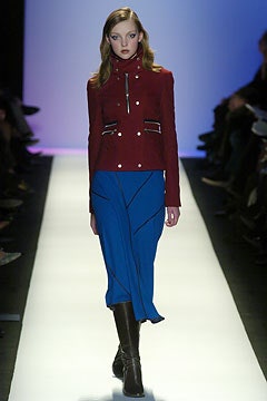 red fitted jacket blue midi skirt