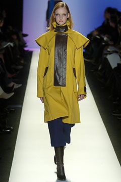 yellow coat with blue pants