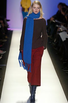 brown sweater red pants blue scarf