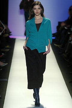 teal cardigan over black dress