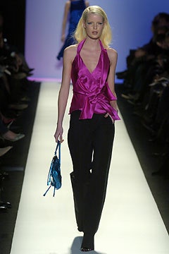 fitted pink top with black pants