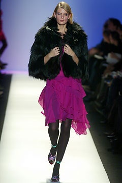 pink ruffled mini dress with black cape