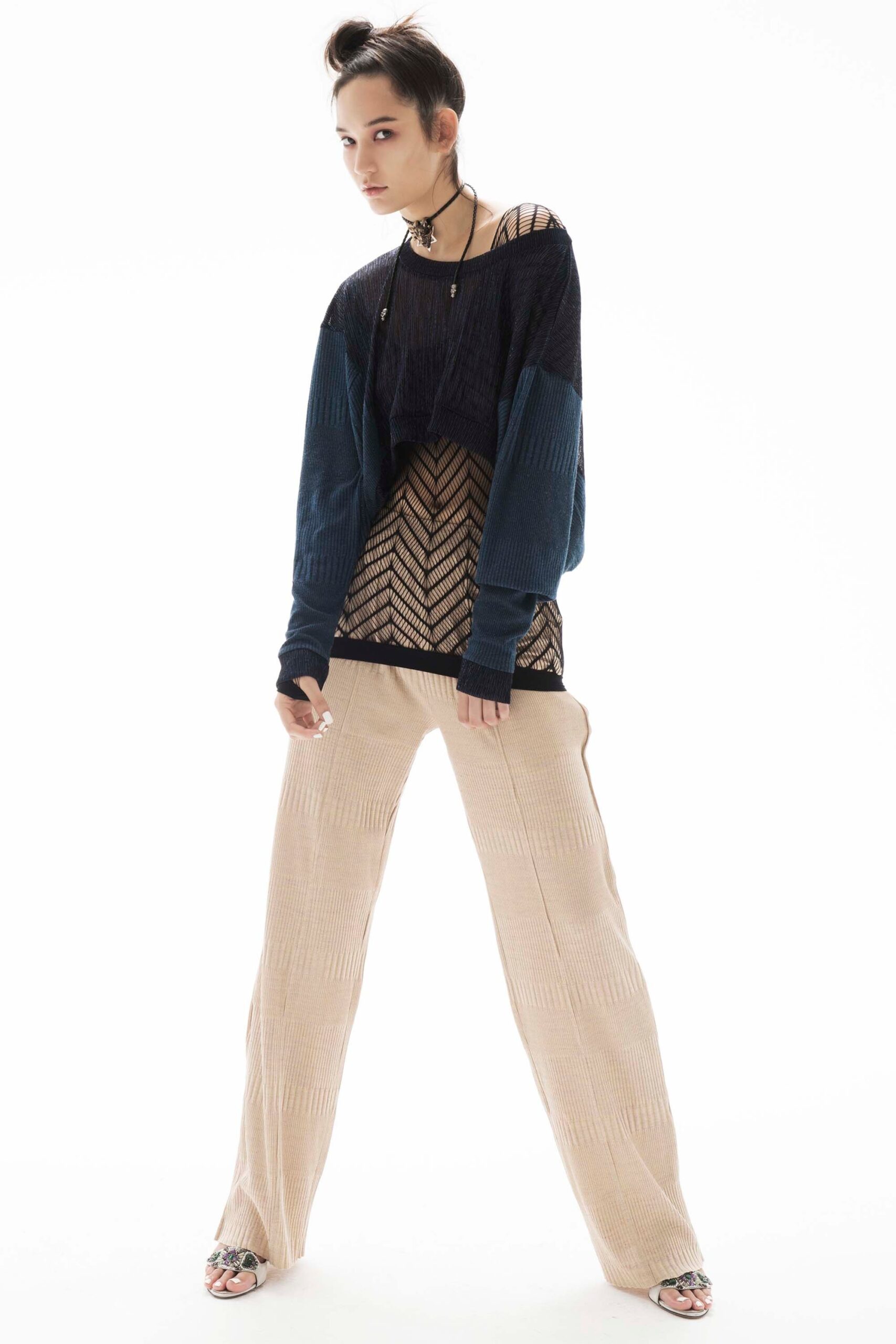 relaxed blue layered top with beige pants