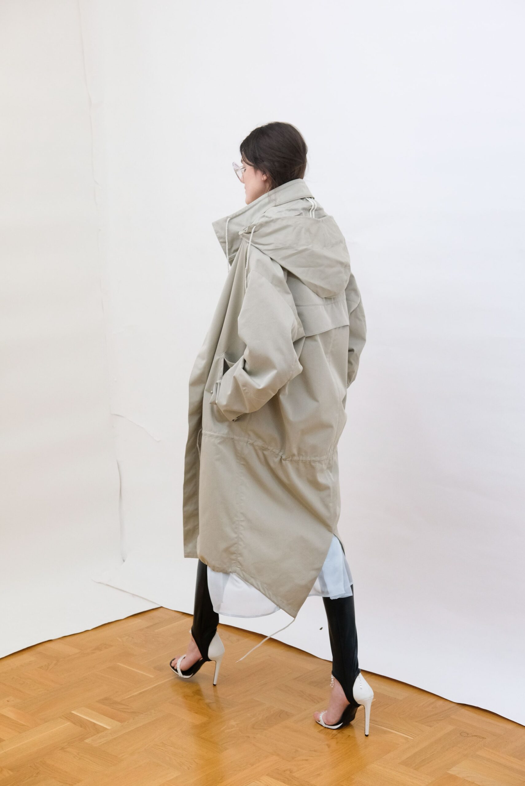 beige oversized coat with black pants
