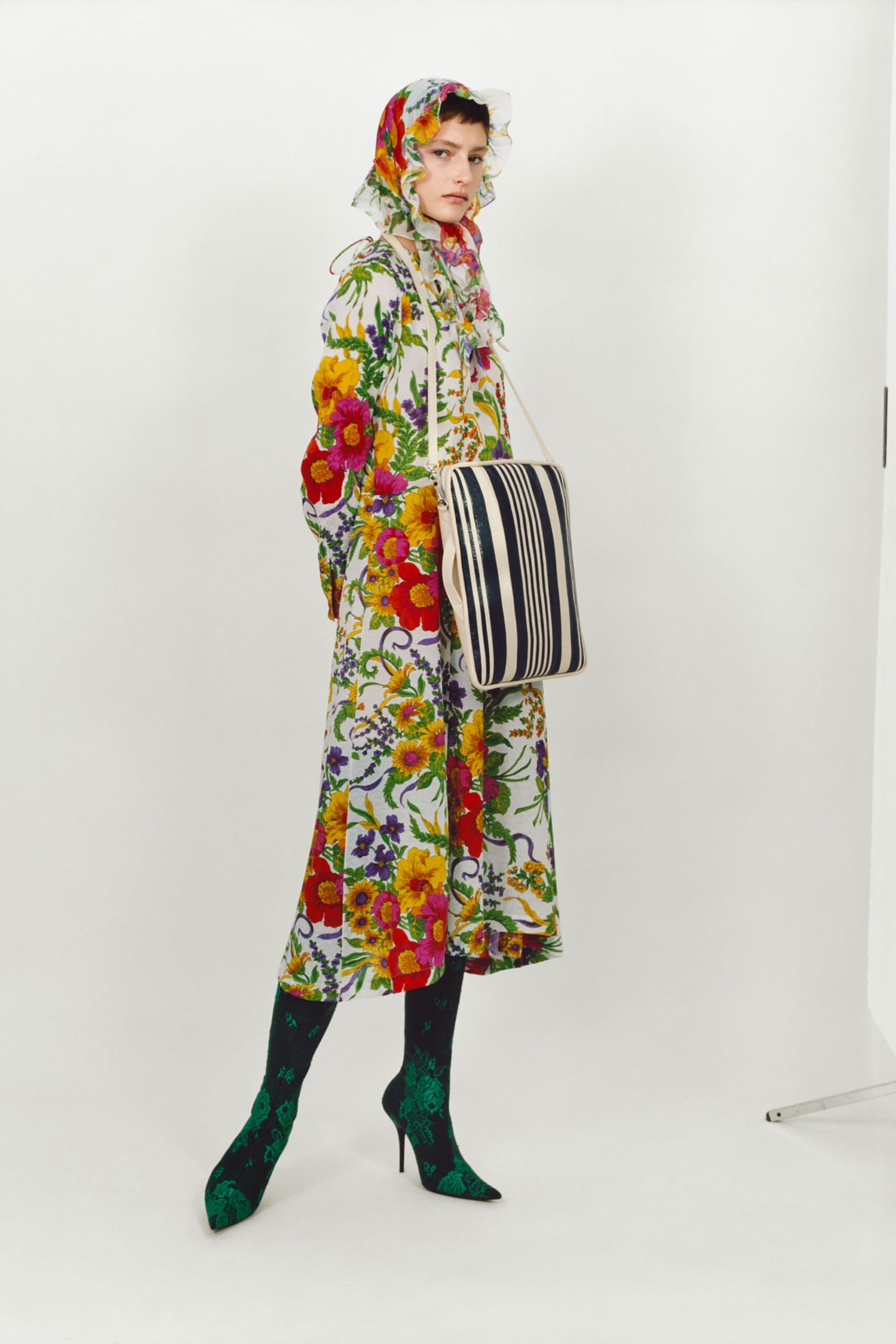 floral maxi dress with striped bag