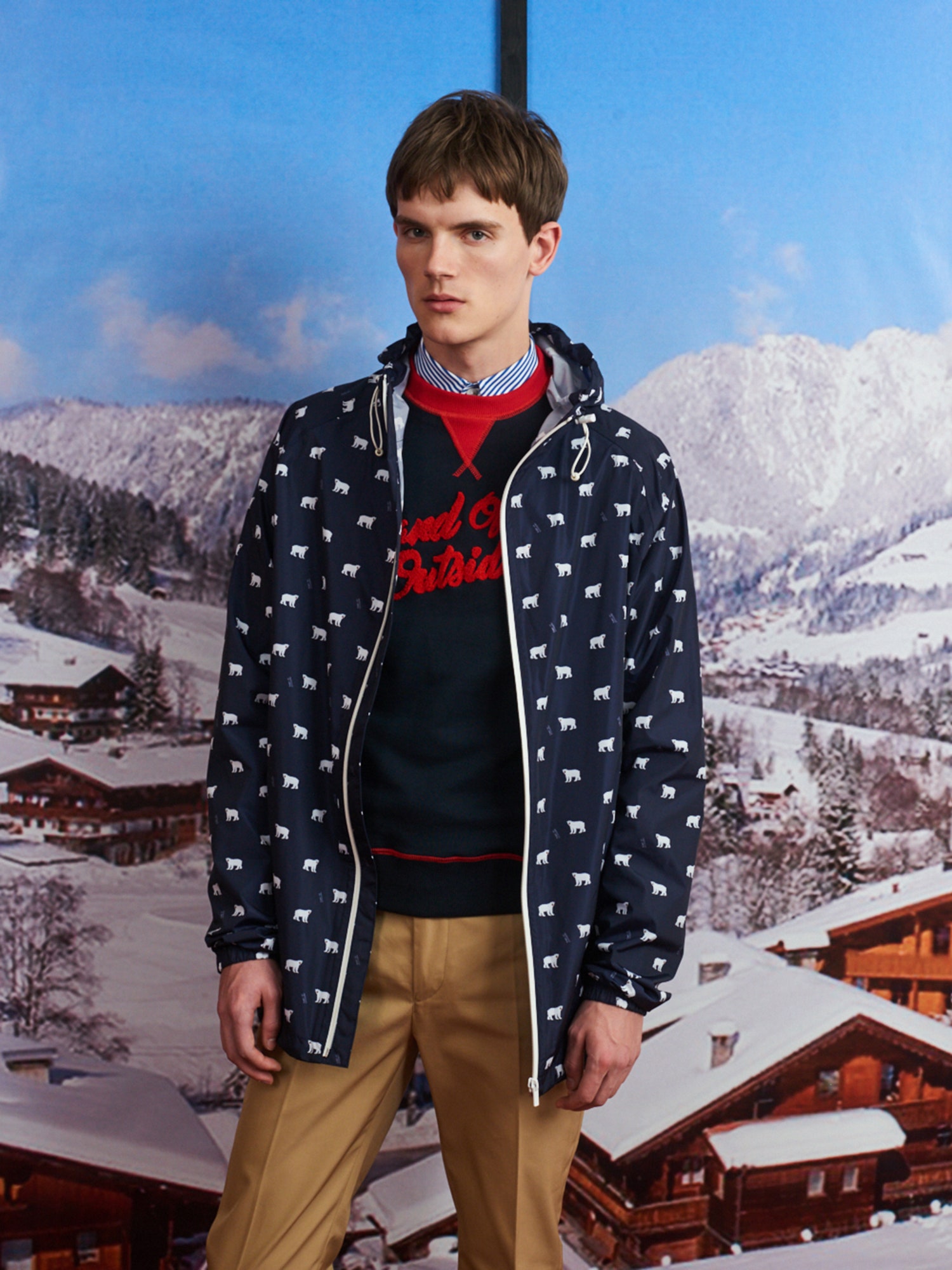 navy printed jacket with red sweater