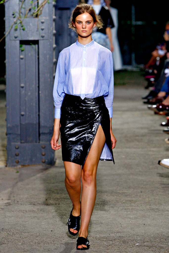 blue striped shirt and black vinyl skirt