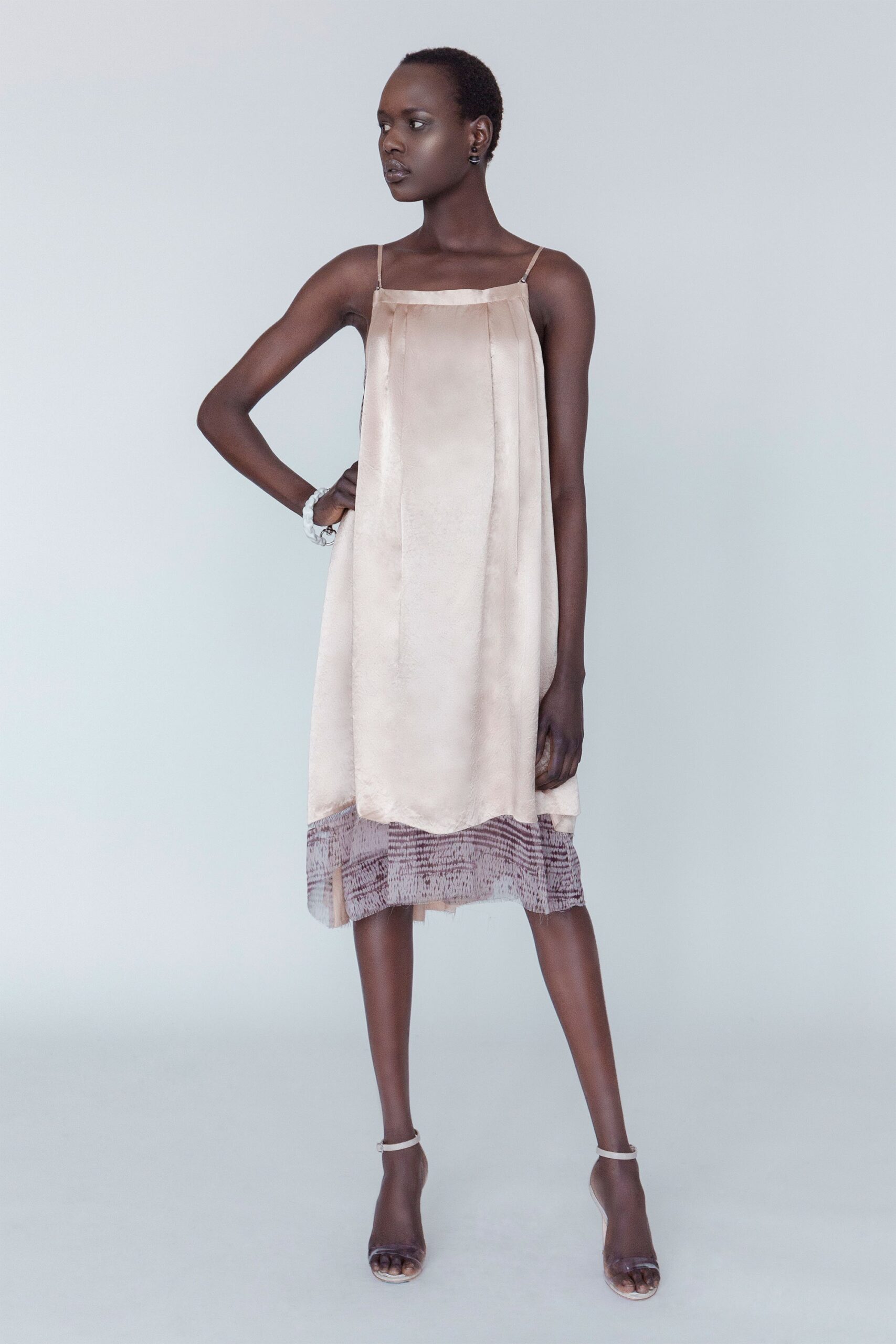 beige silk sleeveless dress