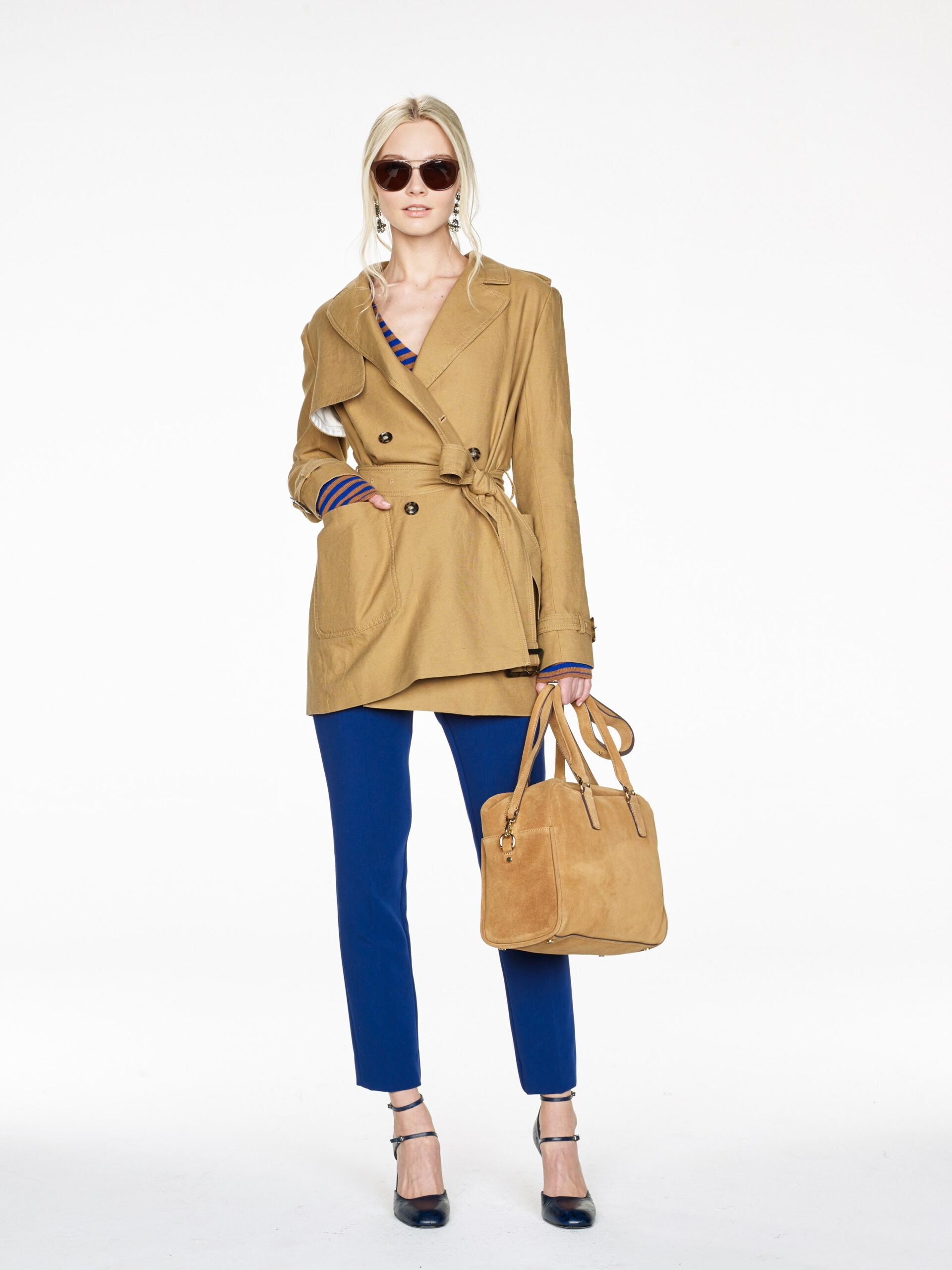 beige trench coat with blue pants