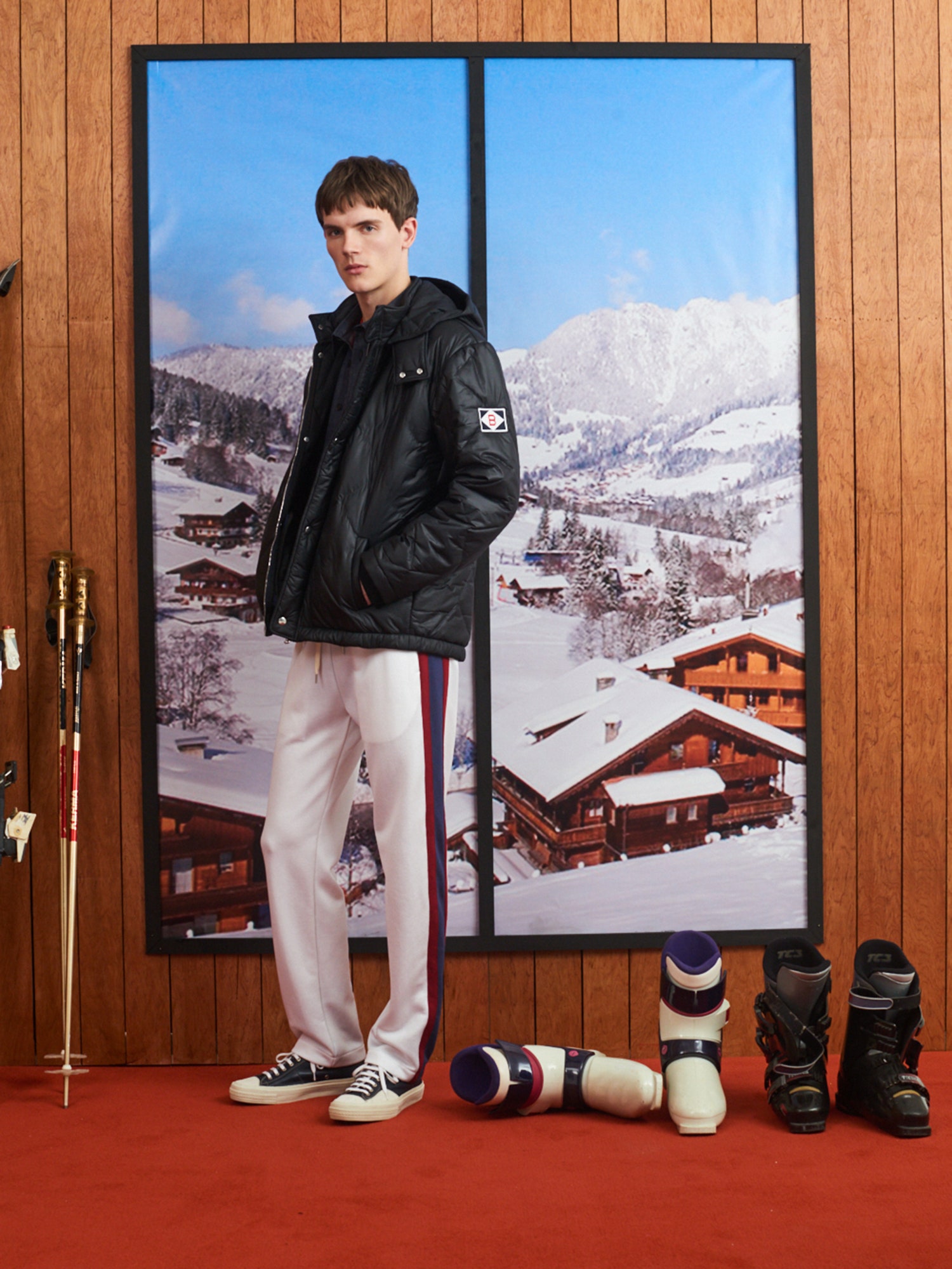 black vinyl hooded jacket and white pants