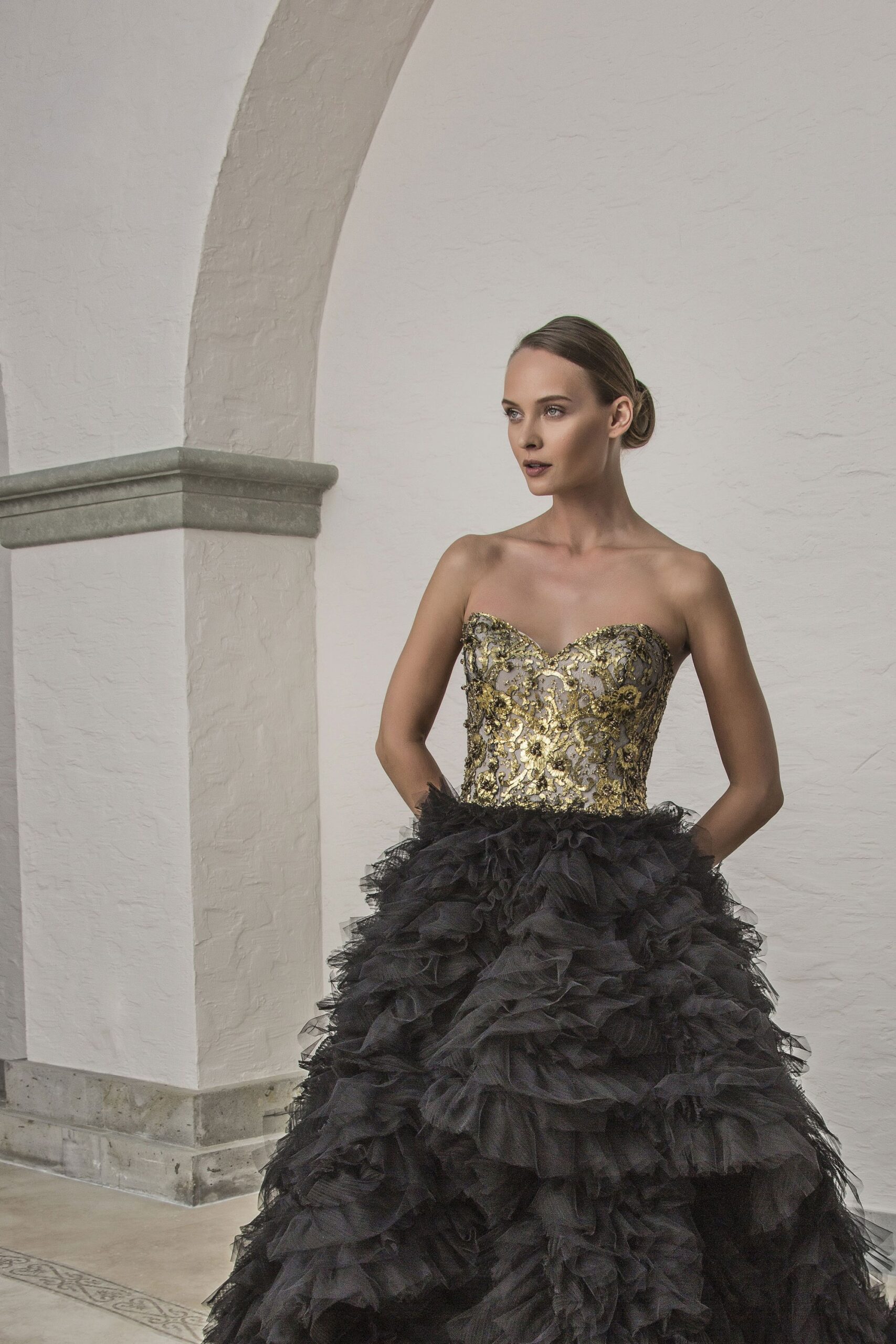 black and gold ruffled gown
