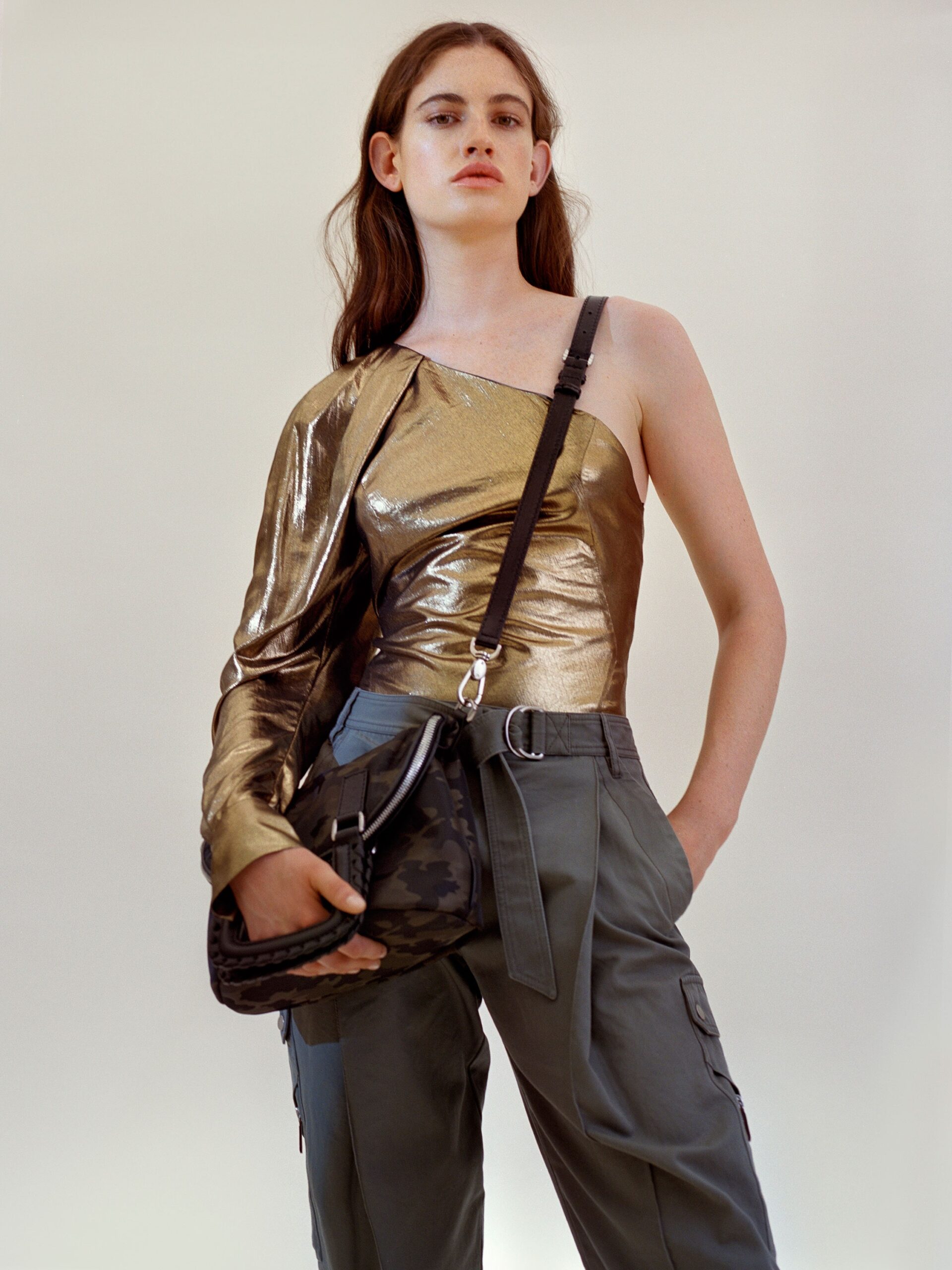 gold metallic asymmetric top and cargo pants