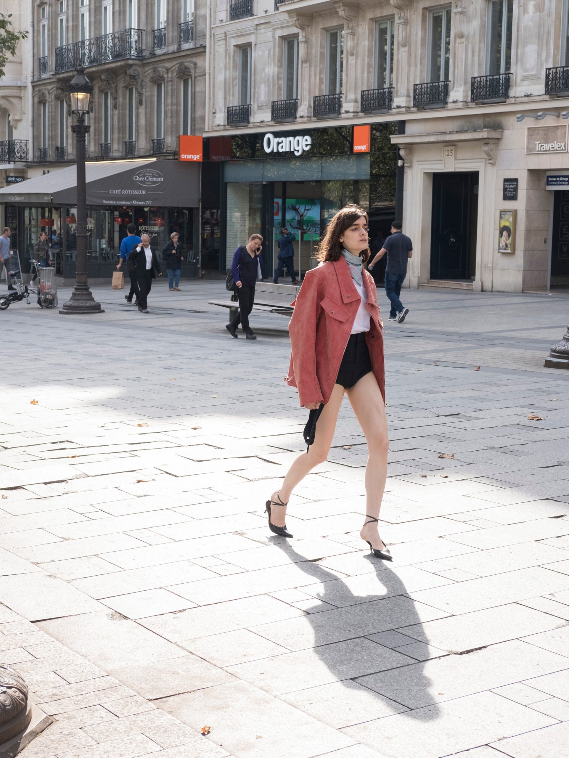 red relaxed jacket with black shorts