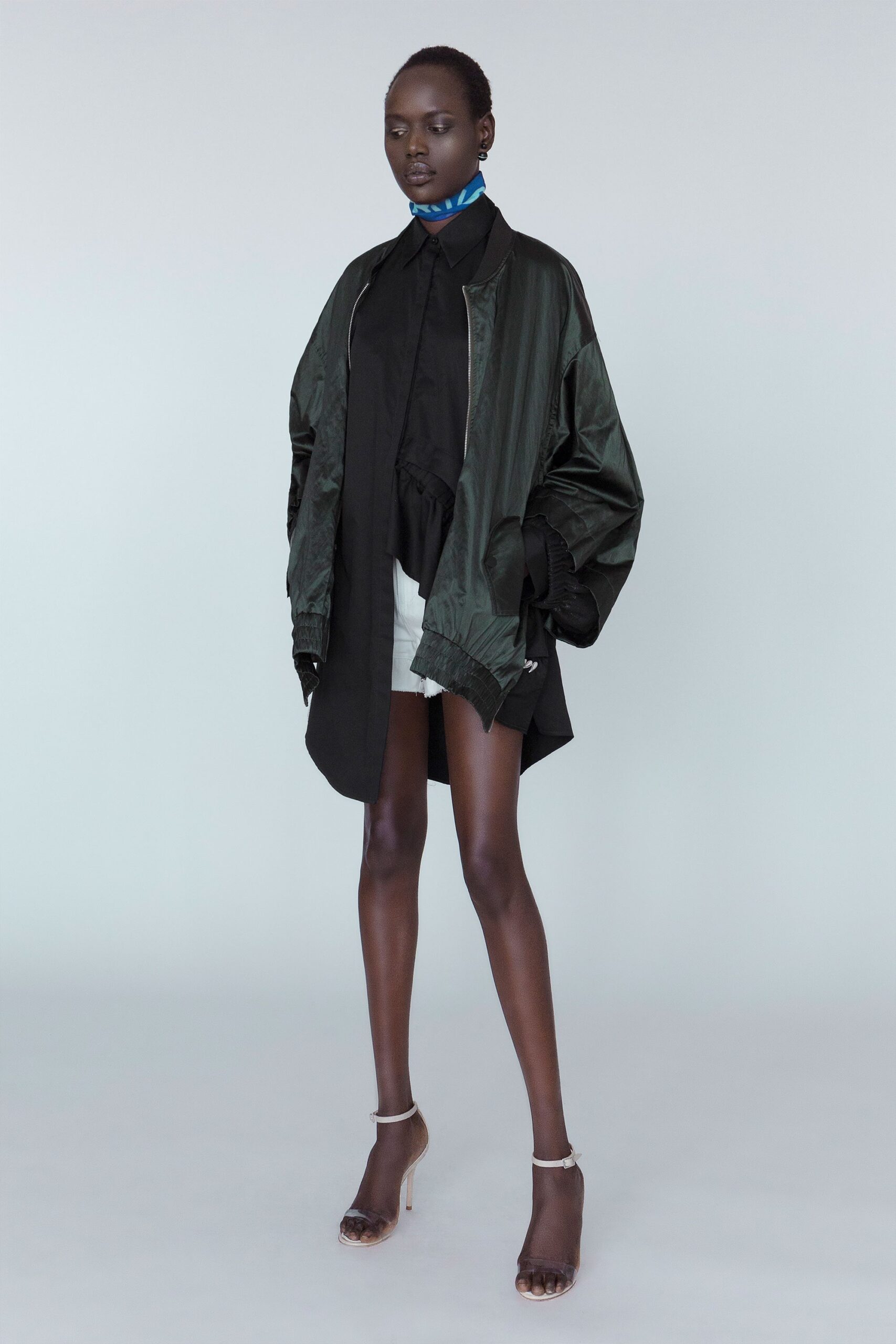 oversized green jacket with black shirt