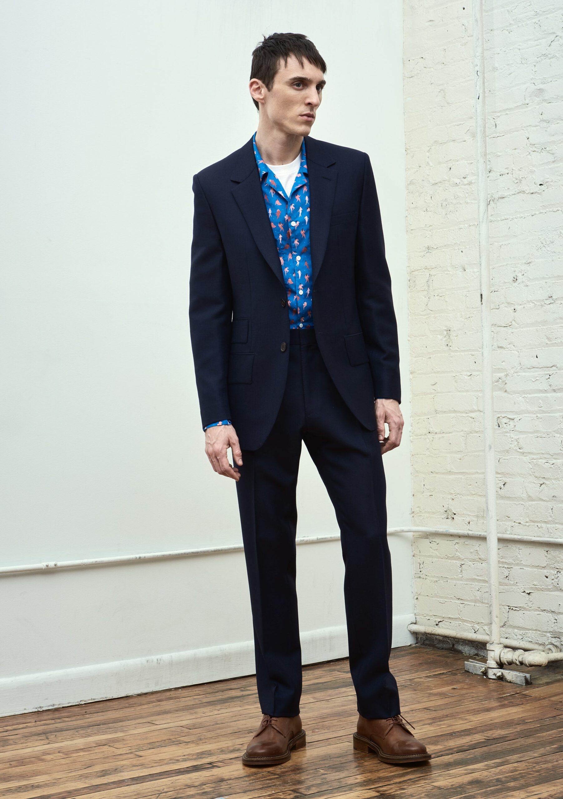 navy tailored suit with printed shirt