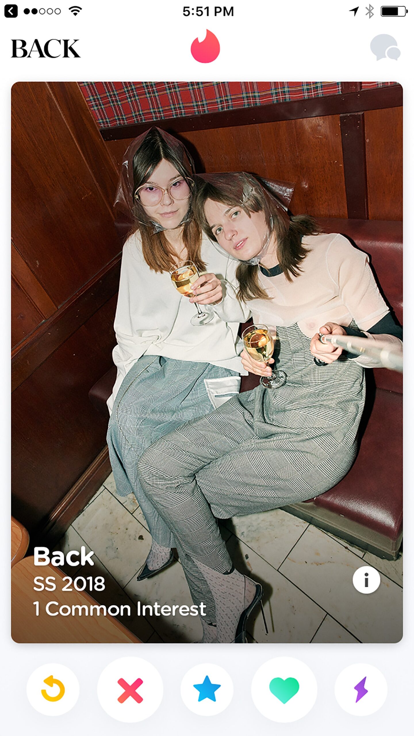 white relaxed top with gray pants