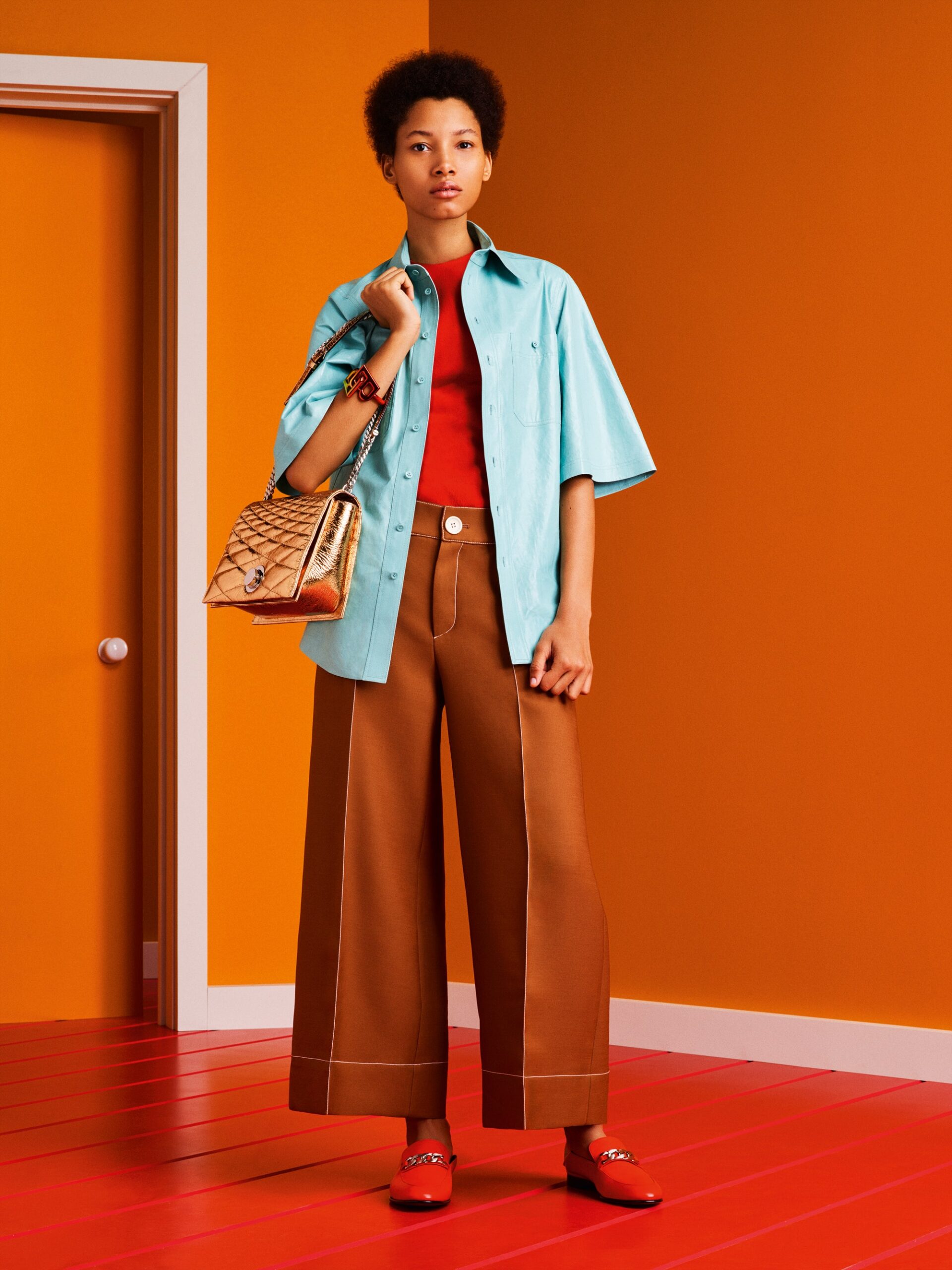 aqua shirt red top brown pants