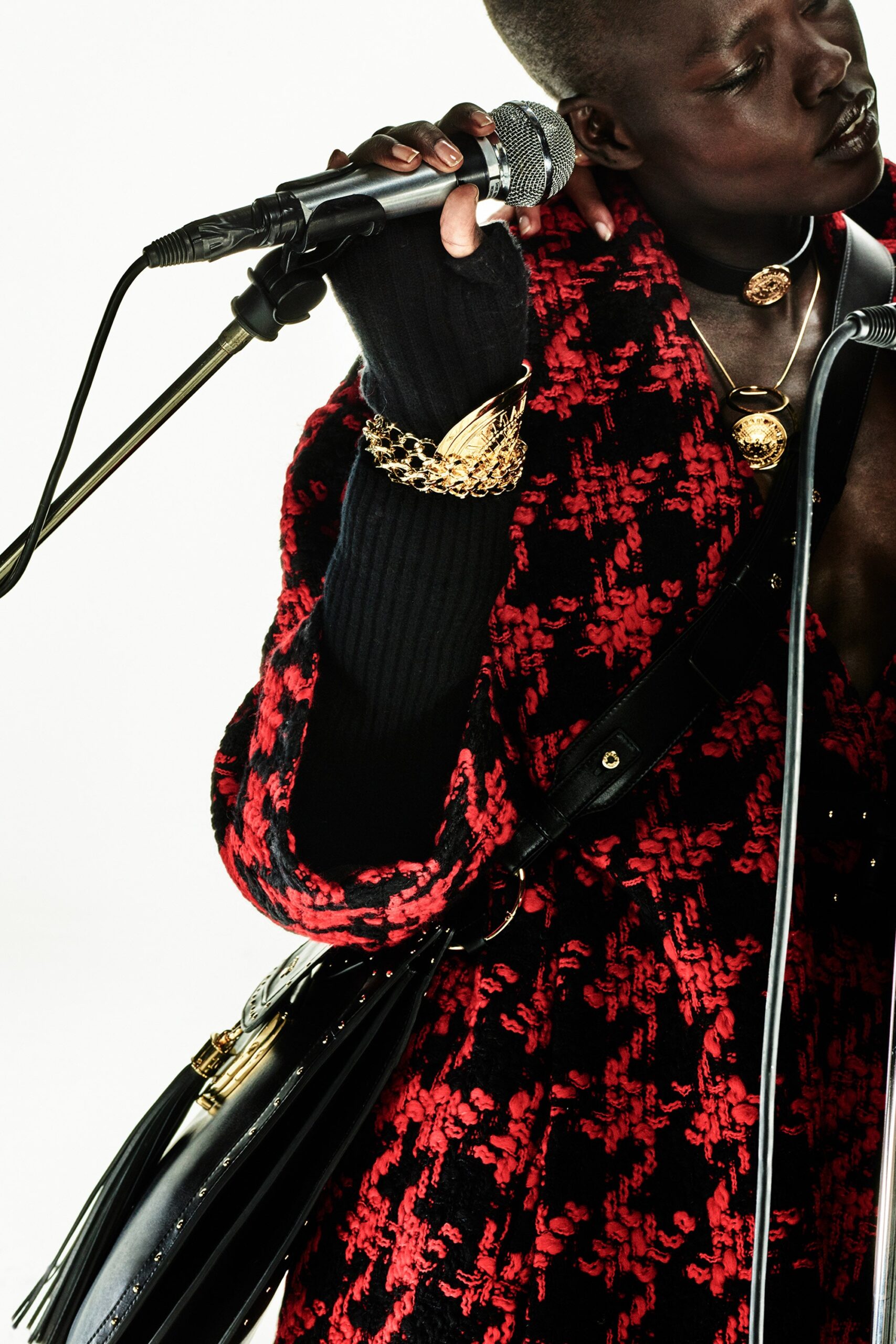 red and black wool coat with black top