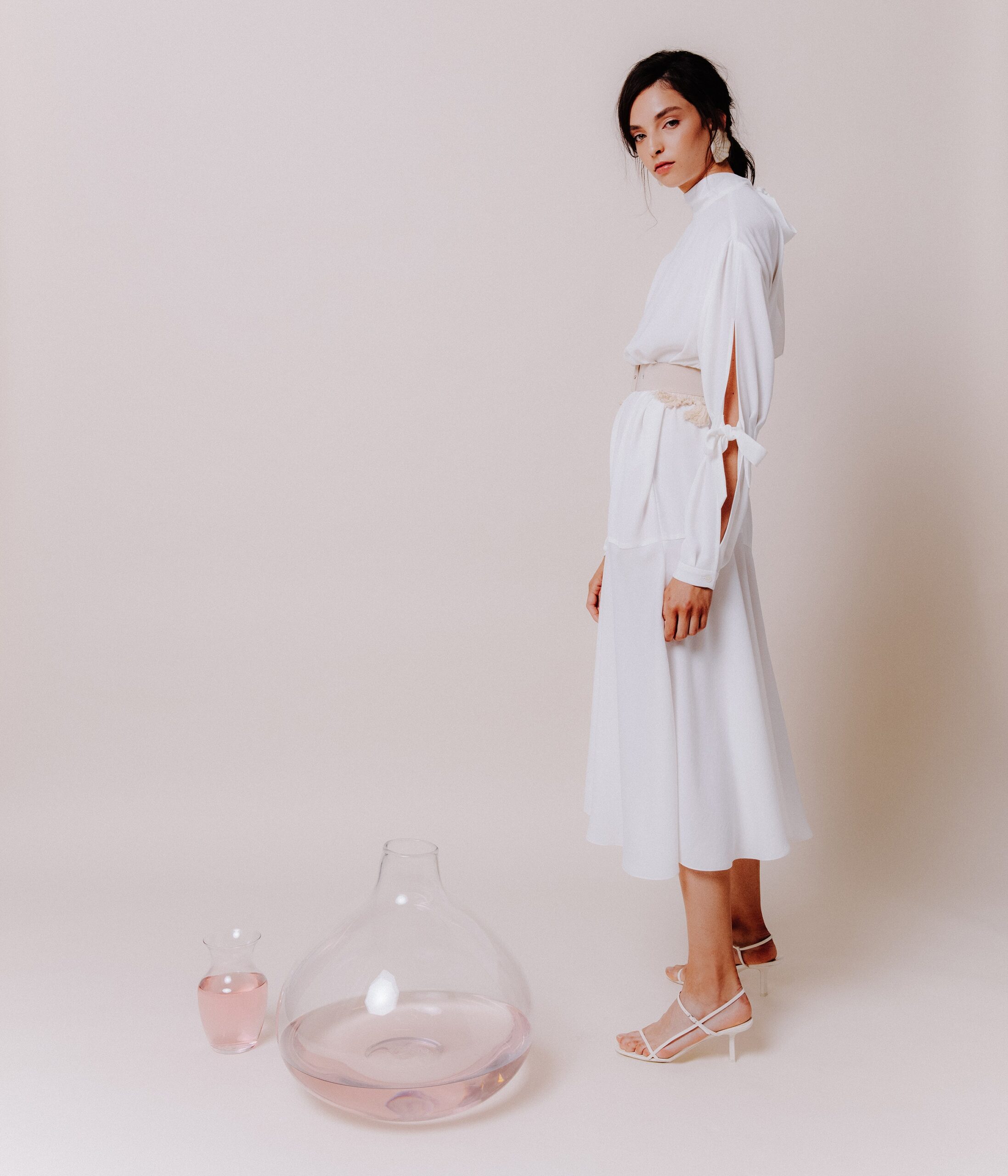 white midi dress with strappy shoes