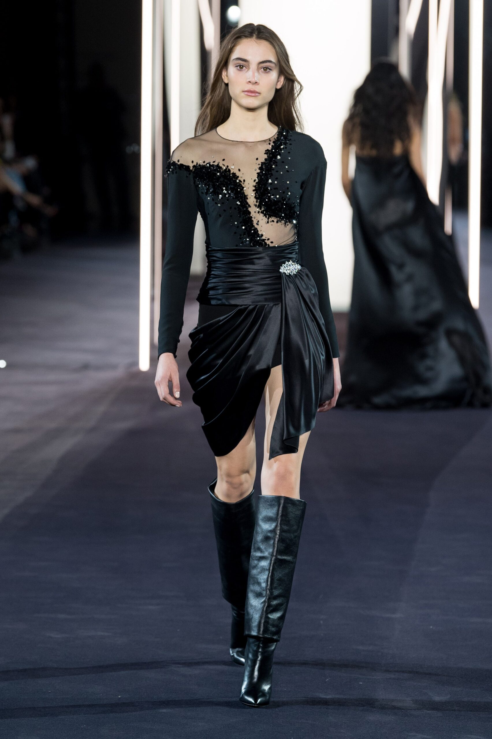 black fitted mini dress with boots
