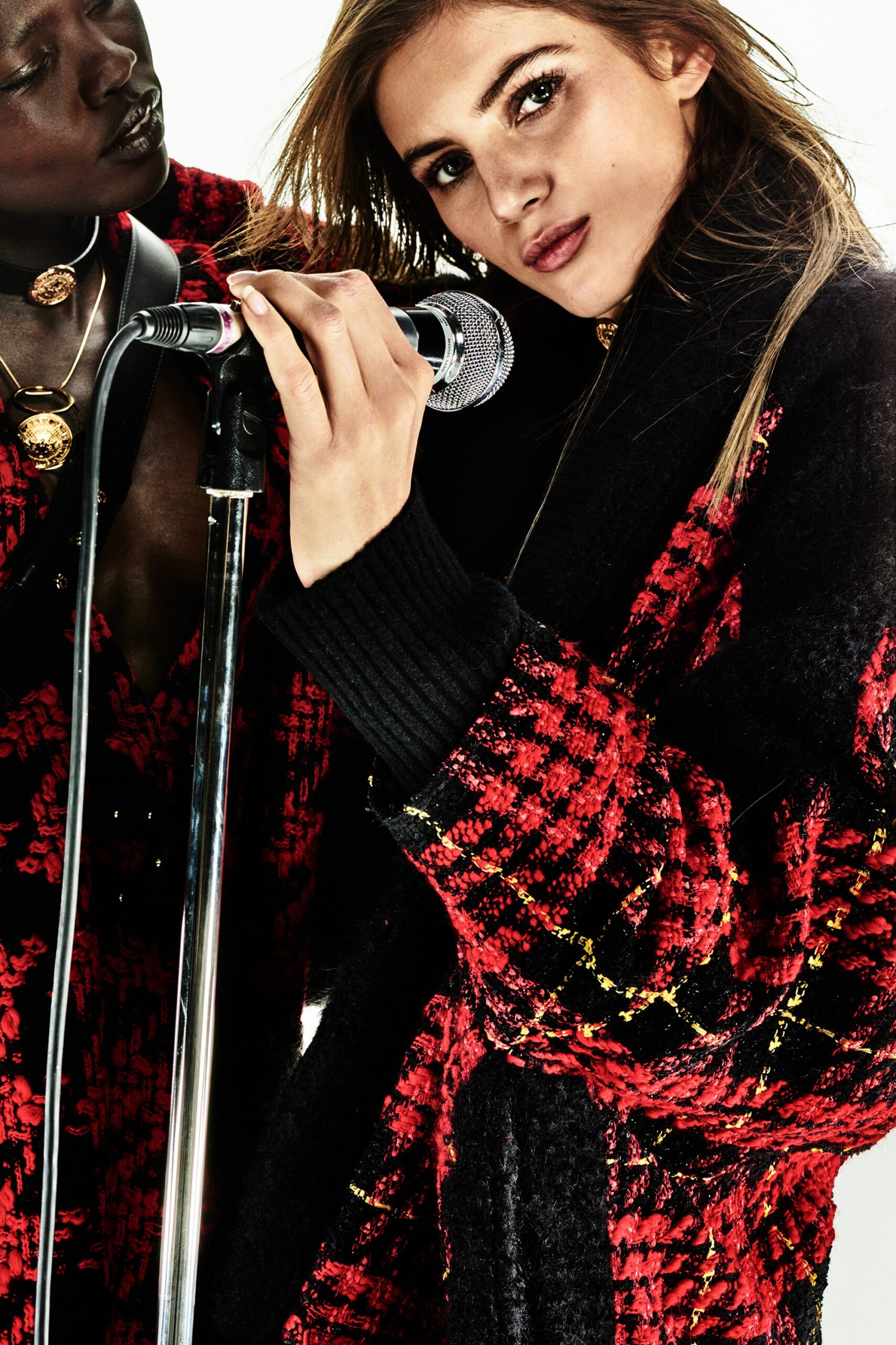 red plaid coat with black top