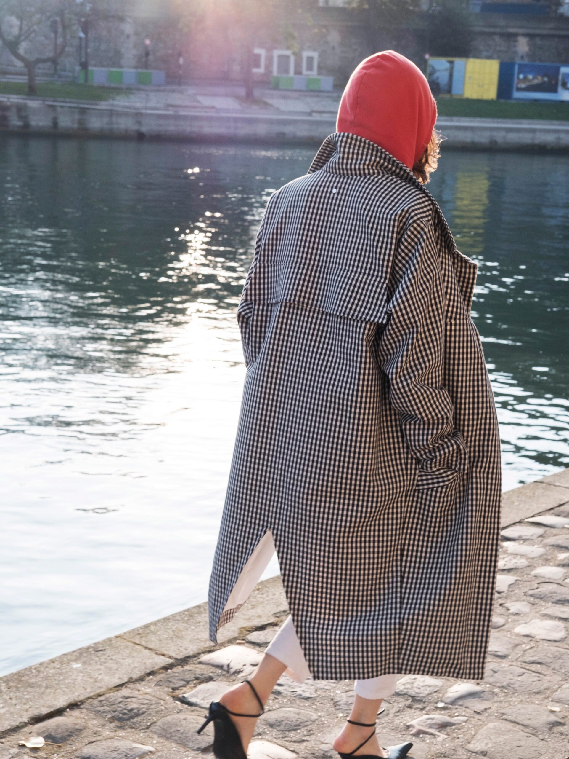 oversized checked coat with red hoodie