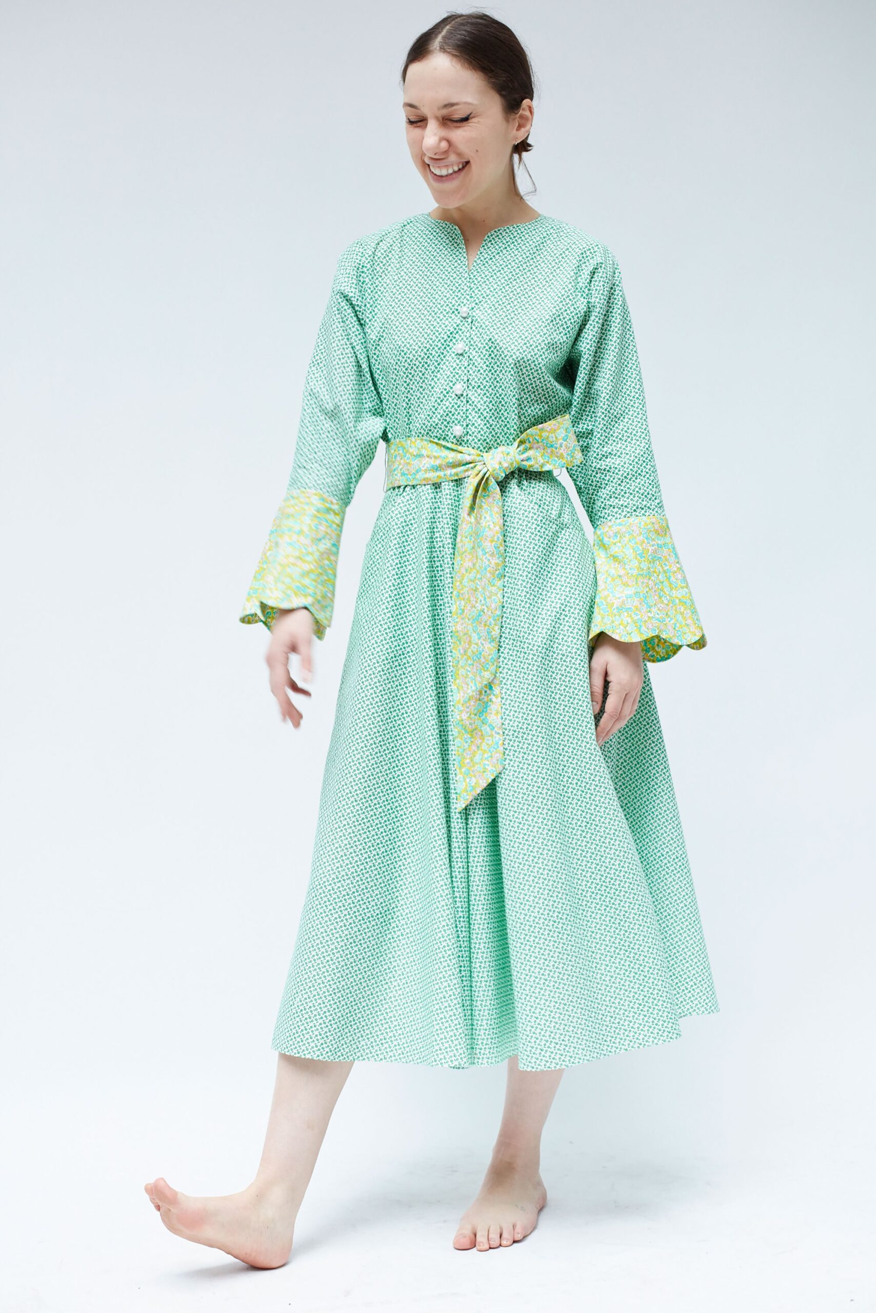 green and yellow belted midi dress