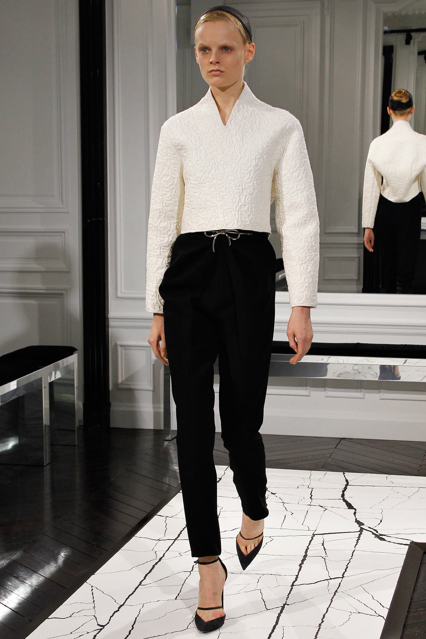 white textured blouse and black tailored pants