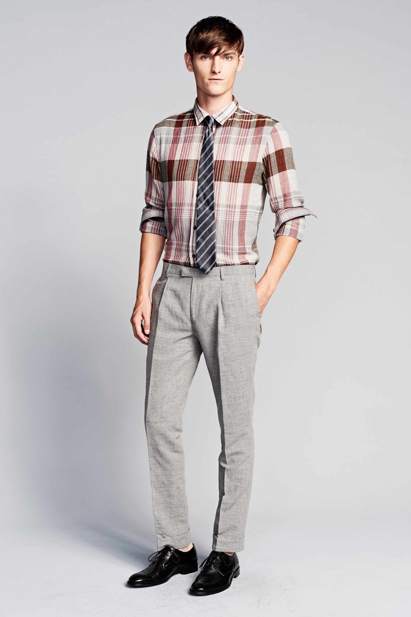 checked shirt with tailored pants
