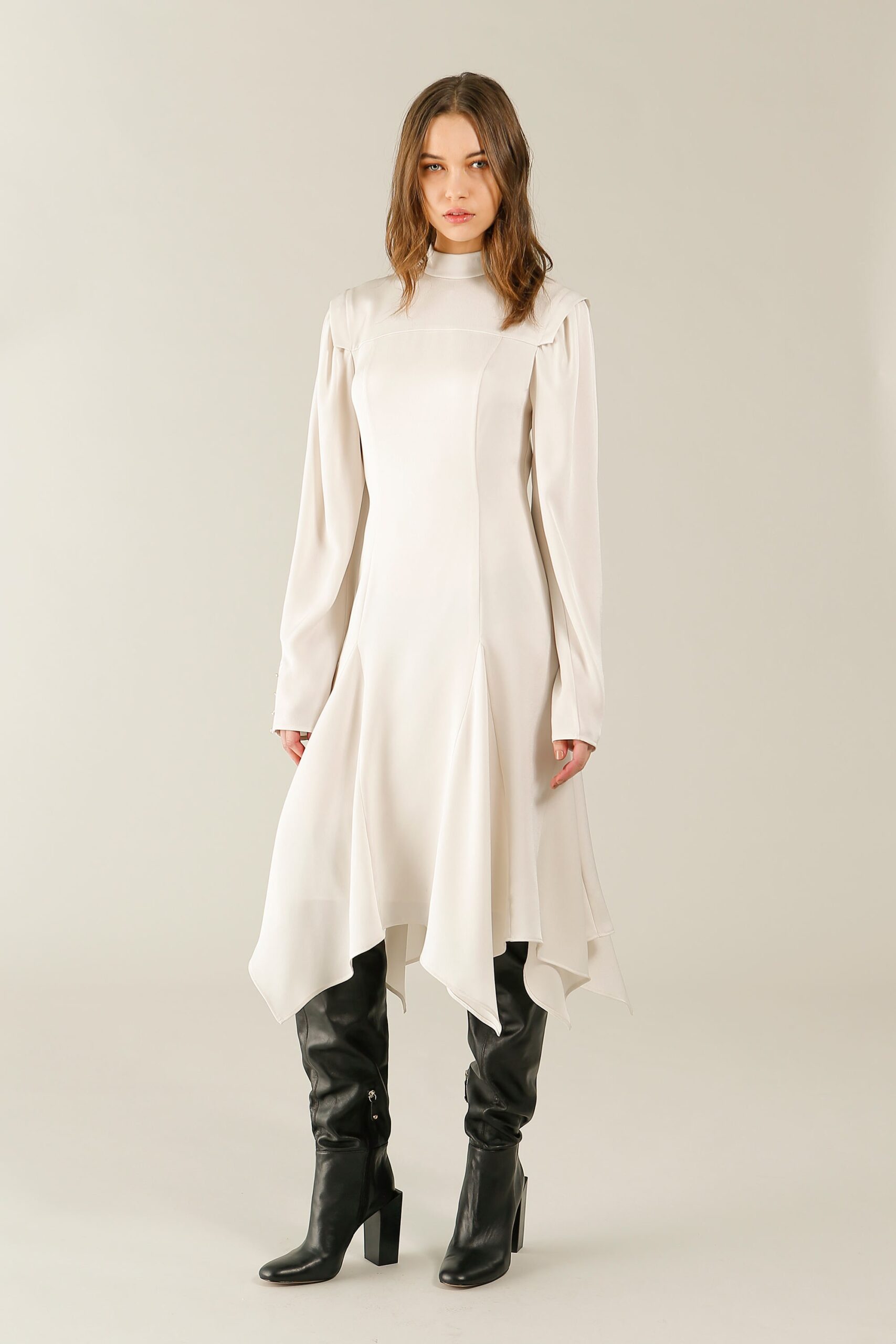 white asymmetric midi dress with black boots