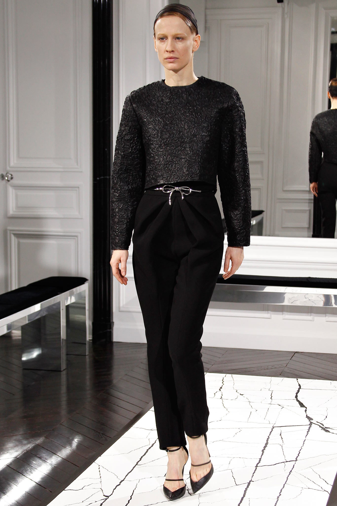 black textured top with tailored pants
