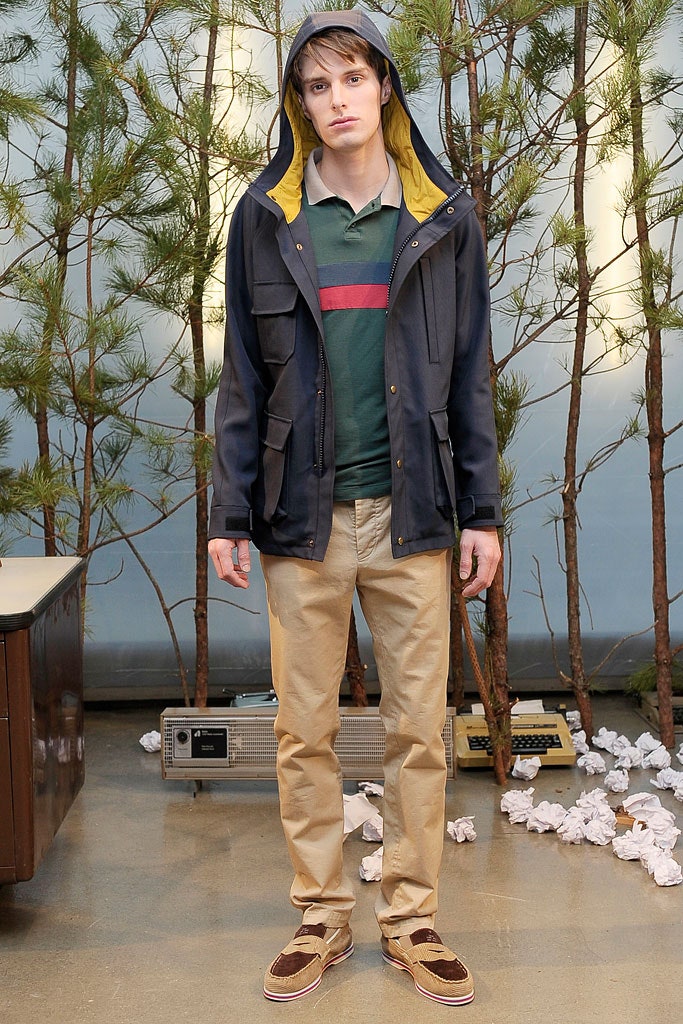 black hooded jacket with green shirt