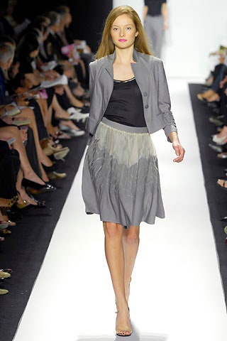 gray blazer black top pleated skirt
